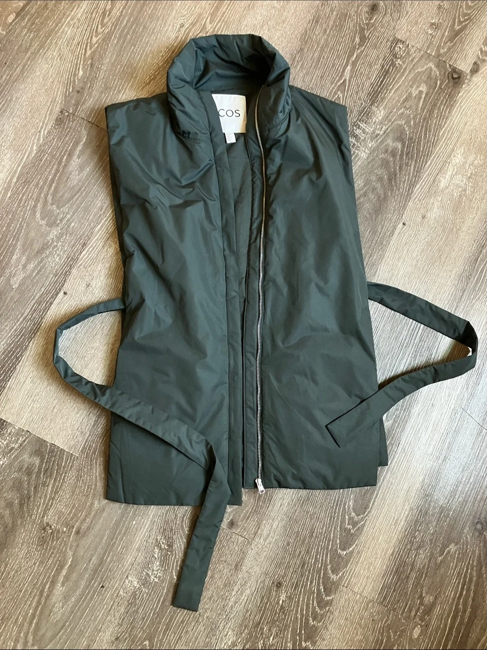 dark green COS high-neck padded vest